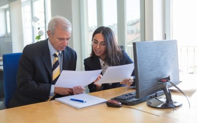 female-professional-explaining-document-details-client-workplace-serious-business-leader-consulting-financial-legal-expert-teamwork-cooperation-concept
